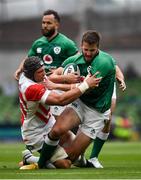 3 July 2021; Stuart McCloskey of Ireland is tackled by Pieter Labuschagne of Japan during the International Rugby Friendly match between Ireland and Japan at Aviva Stadium in Dublin. Photo by David Fitzgerald/Sportsfile