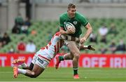 3 July 2021; Chris Farrell of Ireland is tackled by Semisi Masirewa of Japan during the International Rugby Friendly match between Ireland and Japan at Aviva Stadium in Dublin. Photo by Brendan Moran/Sportsfile