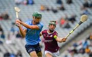 3 July 2021; Chris Crummey of Dublin shoots to score his side's first goal, despite pressure from Galway's Fintan Burke, during the Leinster GAA Hurling Senior Championship Semi-Final match between Dublin and Galway at Croke Park in Dublin. Photo by Seb Daly/Sportsfile