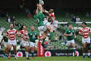 3 July 2021; Shane Daly, left, and Ryan Baird of Ireland contest a high ball with Semisi Masirewa of Japan during the International Rugby Friendly match between Ireland and Japan at Aviva Stadium in Dublin. Photo by Brendan Moran/Sportsfile