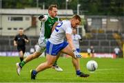 3 July 2021; Micheál Bannigan of Monaghan in action against Declan McCusker of Fermanagh during the Ulster GAA Football Senior Championship Quarter-Final match between Monaghan and Fermanagh at St Tiernach’s Park in Clones, Monaghan. Photo by Sam Barnes/Sportsfile