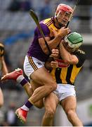 3 July 2021; Lee Chin of Wexford is fouled by Paddy Deegan of Kilkenny, after passing the ball, during the Leinster GAA Hurling Senior Championship Semi-Final match between Kilkenny and Wexford at Croke Park in Dublin. Photo by Piaras Ó Mídheach/Sportsfile