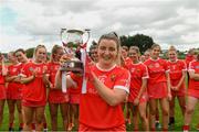 3 July 2021; Cork captain Linda Collins lifts the cup after the Munster Senior Camogie Final match between Cork and Limerick at Drom & Inch GAA in Tipperary.  Photo by Matt Browne/Sportsfile