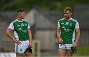 3 July 2021; Fermanagh players Sean Cassidy, left, and Ultan Kelm dejected after their side's defeat in the Ulster GAA Football Senior Championship Quarter-Final match between Monaghan and Fermanagh at St Tiernach’s Park in Clones, Monaghan. Photo by Sam Barnes/Sportsfile