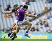 3 July 2021; Connal Flood of Wexford is fouled by Kilkenny goalkeeper Eoin Murphy, resulting in a penalty, during the Leinster GAA Hurling Senior Championship Semi-Final match between Kilkenny and Wexford at Croke Park in Dublin. Photo by Seb Daly/Sportsfile