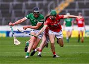 3 July 2021; Gearoid Hegarty of Limerick in action against Seamus Harnedy of Cork during the Munster GAA Hurling Senior Championship Semi-Final match between Cork and Limerick at Semple Stadium in Thurles, Tipperary. Photo by Ray McManus/Sportsfile