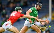 3 July 2021; Gearoid Hegarty of Limerick in action against Mark Coleman of Cork during the Munster GAA Hurling Senior Championship Semi-Final match between Cork and Limerick at Semple Stadium in Thurles, Tipperary. Photo by Stephen McCarthy/Sportsfile