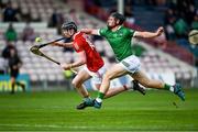 3 July 2021; Conor Cahalane of Cork is tackled by Peter Casey of Limerick during the Munster GAA Hurling Senior Championship Semi-Final match between Cork and Limerick at Semple Stadium in Thurles, Tipperary. Photo by Ray McManus/Sportsfile