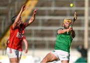 3 July 2021; Darragh Fitzgibbon of Cork attempts to block a shot from Tom Morrisey of Limerick during the Munster GAA Hurling Senior Championship Semi-Final match between Cork and Limerick at Semple Stadium in Thurles, Tipperary. Photo by Ray McManus/Sportsfile