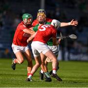 3 July 2021; Tom Morrisey of Limerick in action against Tim O’Mahony, 5, Eoin Cadogan and Mark Coleman of Cork during the Munster GAA Hurling Senior Championship Semi-Final match between Cork and Limerick at Semple Stadium in Thurles, Tipperary. Photo by Ray McManus/Sportsfile