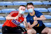 3 July 2021; Two Cork supporters during the Munster GAA Hurling Senior Championship Semi-Final match between Cork and Limerick at Semple Stadium in Thurles, Tipperary. Photo by Ray McManus/Sportsfile