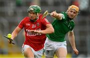 3 July 2021; Alan Cadogan of Cork in action against Richie English of Limerick during the Munster GAA Hurling Senior Championship Semi-Final match between Cork and Limerick at Semple Stadium in Thurles, Tipperary. Photo by Stephen McCarthy/Sportsfile