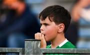 3 July 2021; Daragh Flanagan, aged 8, from Kilteely, Limerick, watches the closing stages of the Munster GAA Hurling Senior Championship Semi-Final match between Cork and Limerick at Semple Stadium in Thurles, Tipperary. Photo by Ray McManus/Sportsfile
