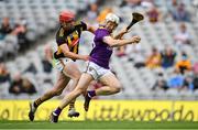 3 July 2021; David Dunne of Wexford holds off the challenge of Kilkenny's James Maher on his way to scoring his side's first goal during the Leinster GAA Hurling Senior Championship Semi-Final match between Kilkenny and Wexford at Croke Park in Dublin. Photo by Seb Daly/Sportsfile