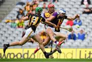 3 July 2021; Lee Chin of Wexford in action against Tommy Walsh, left, amd Huw Lawlor of Kilkenny during the Leinster GAA Hurling Senior Championship Semi-Final match between Kilkenny and Wexford at Croke Park in Dublin. Photo by Seb Daly/Sportsfile