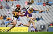 3 July 2021; David Dunne of Wexford is pulled back by Kilkenny's James Maher on his way to scoring his side's first goal during the Leinster GAA Hurling Senior Championship Semi-Final match between Kilkenny and Wexford at Croke Park in Dublin. Photo by Seb Daly/Sportsfile