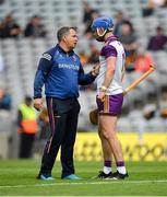 3 July 2021; Wexford manager Davy Fitzgerald in conversation with goalkeeper Mark Fanning before the Leinster GAA Hurling Senior Championship Semi-Final match between Kilkenny and Wexford at Croke Park in Dublin. Photo by Seb Daly/Sportsfile