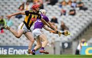 3 July 2021; David Dunne of Wexford shoots to score his side's first goal, under pressure from James Maher of Kilkenny, during the Leinster GAA Hurling Senior Championship Semi-Final match between Kilkenny and Wexford at Croke Park in Dublin. Photo by Seb Daly/Sportsfile