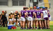 3 July 2021; Wexford players form a huddle during half-time of extra-time during the Leinster GAA Hurling Senior Championship Semi-Final match between Kilkenny and Wexford at Croke Park in Dublin. Photo by Seb Daly/Sportsfile