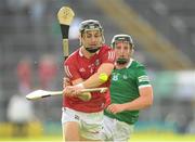 3 July 2021; Mark Coleman of Cork in action against Peter Casey of Limerick during the Munster GAA Hurling Senior Championship Semi-Final match between Cork and Limerick at Semple Stadium in Thurles, Tipperary. Photo by Stephen McCarthy/Sportsfile