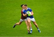 4 July 2021; Sean Byrne of Laois in action against Rónan O'Toole of Westmeath during the Leinster GAA Football Senior Championship Quarter-Final match between Laois and Westmeath at Bord Na Mona O'Connor Park in Tullamore, Offaly. Photo by Eóin Noonan/Sportsfile