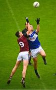 4 July 2021; John O'Loughlin of Laois in action against Sam Duncan of Westmeath during the Leinster GAA Football Senior Championship Quarter-Final match between Laois and Westmeath at Bord Na Mona O'Connor Park in Tullamore, Offaly. Photo by Eóin Noonan/Sportsfile