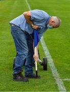 4 July 2021; Groundsman Eugene Griffin places the sideline flags before the Munster GAA Hurling Senior Championship Semi-Final match between Tipperary and Clare at LIT Gaelic Grounds in Limerick. Photo by Ray McManus/Sportsfile