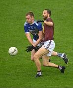 4 July 2021; Dónal Kingston of Laois in action against Kevin Maguire of Westmeath during the Leinster GAA Football Senior Championship Quarter-Final match between Laois and Westmeath at Bord Na Mona O'Connor Park in Tullamore, Offaly. Photo by Eóin Noonan/Sportsfile