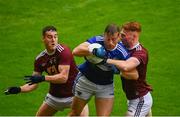 4 July 2021; Kieran Lillis of Laois in action against Sam Duncan, left, and Ronan Wallace of Westmeath during the Leinster GAA Football Senior Championship Quarter-Final match between Laois and Westmeath at Bord Na Mona O'Connor Park in Tullamore, Offaly. Photo by Eóin Noonan/Sportsfile