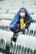 4 July 2021; Clare supporter Steven Murrihy from Quilty, Co Clare sits in the open stand before the Munster GAA Hurling Senior Championship Semi-Final match between Tipperary and Clare at LIT Gaelic Grounds in Limerick. Photo by Stephen McCarthy/Sportsfile