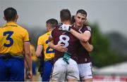 4 July 2021; Galway players Matthew Tierney, right, and Paul Conroy celebrate after their side's victory in the Connacht GAA Football Senior Championship Semi-Final match between Roscommon and Galway at Dr Hyde Park in Roscommon. Photo by Sam Barnes/Sportsfile