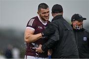 4 July 2021; Damien Comer of Galway celebrates with a member of the Galway backroom team after their side's victory in the Connacht GAA Football Senior Championship Semi-Final match between Roscommon and Galway at Dr Hyde Park in Roscommon. Photo by Sam Barnes/Sportsfile