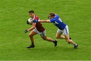 4 July 2021; Denis Corroon of Westmeath in action against Kieran Lillis of Laois during the Leinster GAA Football Senior Championship Quarter-Final match between Laois and Westmeath at Bord Na Mona O'Connor Park in Tullamore, Offaly. Photo by Eóin Noonan/Sportsfile