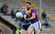 4 July 2021; Brian Fenton of Dublin in action against Daithí Waters of Wexford during the Leinster GAA Football Senior Championship Quarter-Final match between Wexford and Dublin at Chadwicks Wexford Park in Wexford. Photo by Brendan Moran/Sportsfile