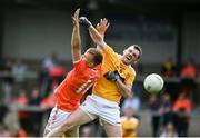4 July 2021; James Laverty of Antrim in action against Rian O'Neill of Armagh during the Ulster GAA Football Senior Championship Quarter-Final match between Armagh and Antrim at the Athletic Grounds in Armagh. Photo by David Fitzgerald/Sportsfile