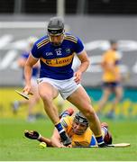 4 July 2021; Dan McCormack of Tipperary in action against Cathal Malone of Clare during the Munster GAA Hurling Senior Championship Semi-Final match between Tipperary and Clare at LIT Gaelic Grounds in Limerick. Photo by Stephen McCarthy/Sportsfile