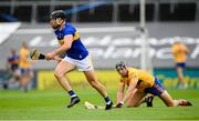 4 July 2021; Dan McCormack of Tipperary in action against Cathal Malone of Clare during the Munster GAA Hurling Senior Championship Semi-Final match between Tipperary and Clare at LIT Gaelic Grounds in Limerick. Photo by Stephen McCarthy/Sportsfile