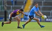 4 July 2021; Cormac Costello of Dublin in action against Liam O'Connor of Wexford during the Leinster GAA Football Senior Championship Quarter-Final match between Wexford and Dublin at Chadwicks Wexford Park in Wexford. Photo by Brendan Moran/Sportsfile