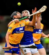 4 July 2021; David Reidy of Clare in action against Brendan Maher of Tipperary during the Munster GAA Hurling Senior Championship Semi-Final match between Tipperary and Clare at LIT Gaelic Grounds in Limerick. Photo by Ray McManus/Sportsfile