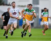 4 July 2021; Kevin Flynn of Kildare in action against Jordan Hayes of Offaly during the Leinster GAA Football Senior Championship Quarter-Final match between Kildare and Offaly at MW Hire O'Moore Park in Portlaoise, Laois. Photo by Piaras Ó Mídheach/Sportsfile