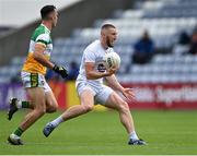 4 July 2021; Neil Flynn of Kildare in action against Colm Doyle of Offaly during the Leinster GAA Football Senior Championship Quarter-Final match between Kildare and Offaly at MW Hire O'Moore Park in Portlaoise, Laois. Photo by Piaras Ó Mídheach/Sportsfile