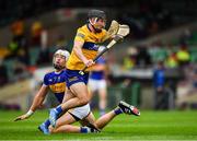 4 July 2021; Ian Galvin of Clare breaks clear of Padraic Maher of Tipperary on his way to score a goal in the sixth minute of the Munster GAA Hurling Senior Championship Semi-Final match between Tipperary and Clare at LIT Gaelic Grounds in Limerick. Photo by Ray McManus/Sportsfile