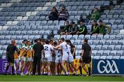 4 July 2021; Players tussle on the sideline at the first half water break during the Leinster GAA Football Senior Championship Quarter-Final match between Kildare and Offaly at MW Hire O'Moore Park in Portlaoise, Laois. Photo by Piaras Ó Mídheach/Sportsfile