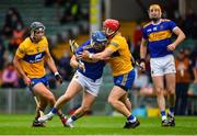 4 July 2021; Willie Connors of Tipperary in action against Paul Flanagan of Clare during the Munster GAA Hurling Senior Championship Semi-Final match between Tipperary and Clare at LIT Gaelic Grounds in Limerick. Photo by Ray McManus/Sportsfile