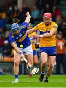 4 July 2021; Willie Connors of Tipperary in action against Paul Flanagan of Clare during the Munster GAA Hurling Senior Championship Semi-Final match between Tipperary and Clare at LIT Gaelic Grounds in Limerick. Photo by Ray McManus/Sportsfile