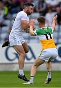 4 July 2021; Fergal Conway of Kildare in action against Peter Cunningham of Offaly during the Leinster GAA Football Senior Championship Quarter-Final match between Kildare and Offaly at MW Hire O'Moore Park in Portlaoise, Laois. Photo by Piaras Ó Mídheach/Sportsfile