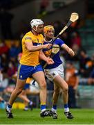 4 July 2021; Conor Cleary of Clare and Séamus Callanan of Tipperary jostle off the ball during the Munster GAA Hurling Senior Championship Semi-Final match between Tipperary and Clare at LIT Gaelic Grounds in Limerick. Photo by Ray McManus/Sportsfile