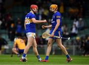 4 July 2021; Dillon Quirke of Tipperary and Clare goalkeeper Eibhear Quilligan fist bump after the Munster GAA Hurling Senior Championship Semi-Final match between Tipperary and Clare at LIT Gaelic Grounds in Limerick. Photo by Ray McManus/Sportsfile