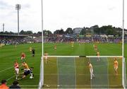 4 July 2021; Conor Turbitt of Armagh shoots to score his side's third goal despite the attempted save from Antrim goalkeeper Luke Mulholland during the Ulster GAA Football Senior Championship Quarter-Final match between Armagh and Antrim at the Athletic Grounds in Armagh. Photo by David Fitzgerald/Sportsfile