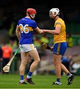 4 July 2021; Dillon Quirke of Tipperary and Conor Cleary of Clare fist bump after the Munster GAA Hurling Senior Championship Semi-Final match between Tipperary and Clare at LIT Gaelic Grounds in Limerick. Photo by Ray McManus/Sportsfile